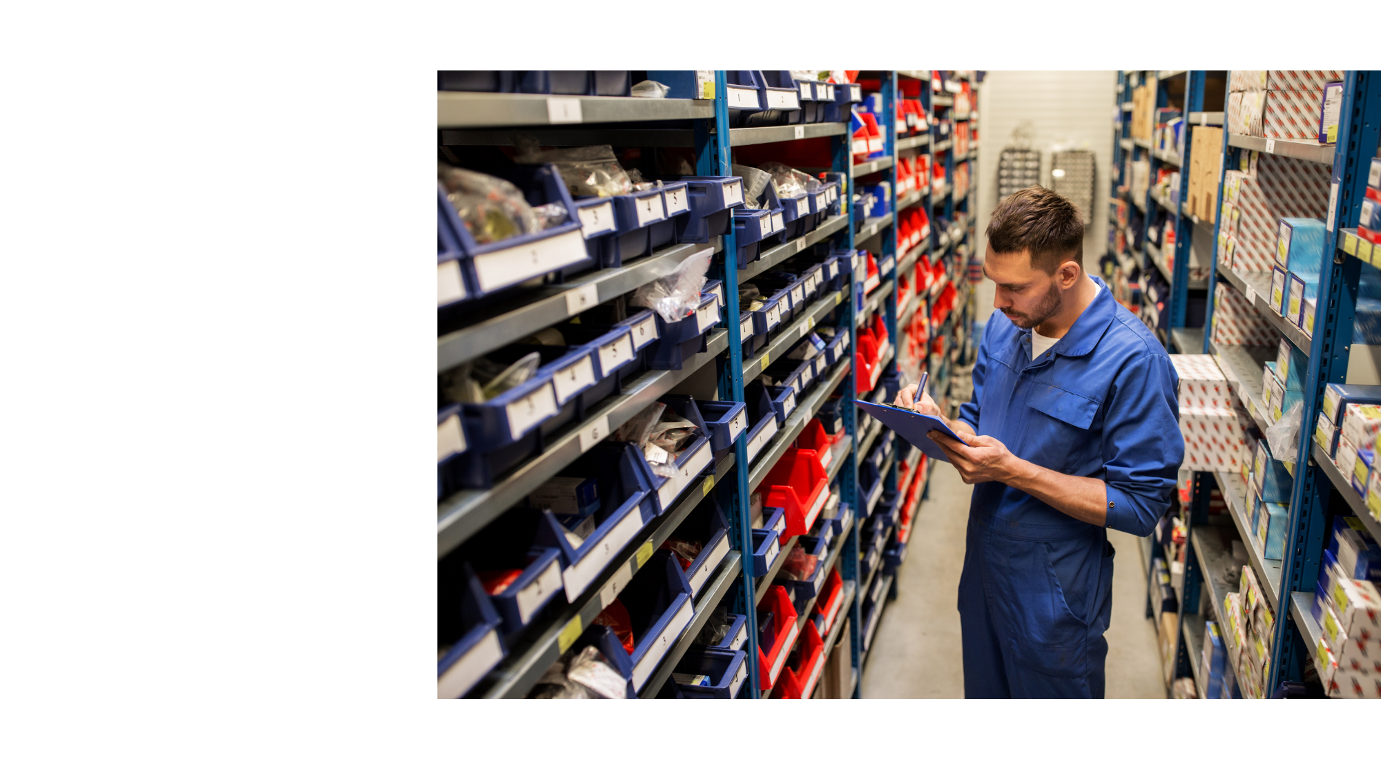 Mechanic browsing parts in warehouse